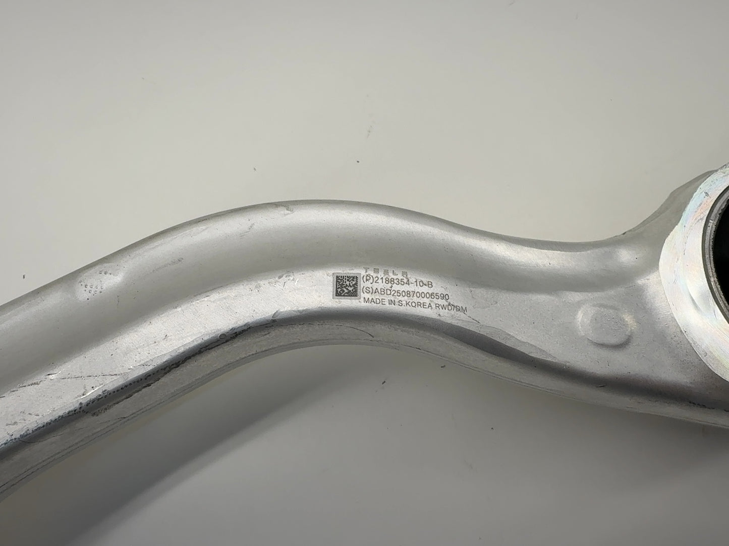 2025 Tesla Model 3 Highland Front Lower Compliance Link Curved Left 2188354-10-B